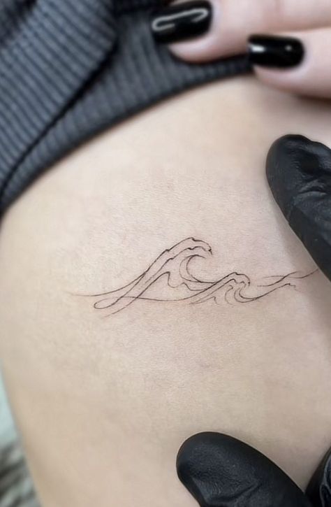 Ocean Wave Tattoo With Name, Collarbone Tattoo Wave, Cute Wave Tattoos, Wave Tattoo Women, Simple Tattoos Thigh, Crashing Waves Tattoo, Wave Tattoo Thigh, Wave Tattoo Ribs, Water Tattoo Minimalist