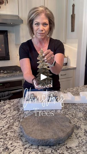 835 reactions · 219 comments | 🌟GOLD CHRISTMAS TREES
🌟Comment SHOP for a link.

When I stumbled across these champagne gold Christmas trees last year, I didn’t realize what a huge hit they would be. Y’all loved them and they sold out quickly. They’re back and on SALE!!

The trees range in size from 6.5”-9.5”. The glass dome they are under is the large one.

✨ You can also shop by clicking the link in my profile or by following me on the LTK @shop.Itk app

#christmasvibes#christmasinspo #christmastime #holidayinspo #christmasideas #ltkhome 
#christmasdecor  #holidaydecor

Holiday console styling | Christmas console table | mini Christmas trees | holiday trees | affordable decor | gold trees | Amazon finds |  glass cloche |  kitchen | home decor | neutral decor | transitional decor | neutr Christmas Cloche Ideas, Christmas Console Table, Gold Christmas Trees, Champagne Christmas Tree, Mini Christmas Trees, Home Decor Neutral, Glass Dome Cloche, Console Styling, Holiday Trees