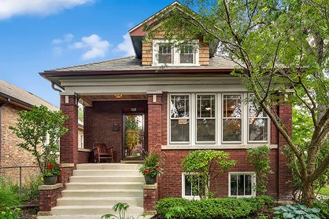 Cute Albany Park bungalow lists for $350K - Curbed Chicagoclockmenumore-arrownoyes : This well-preserved 1920 home is a handsome example of the classic Chicago bungalow style Chicago House Exterior, Bungalow Homes Exterior, Chicago Bungalow Remodel, Bungalow Front Porch Ideas, Brick Bungalow Exterior, Dream Landscaping, American Craftsman House, Clybourne Park, Bungalow Landscaping