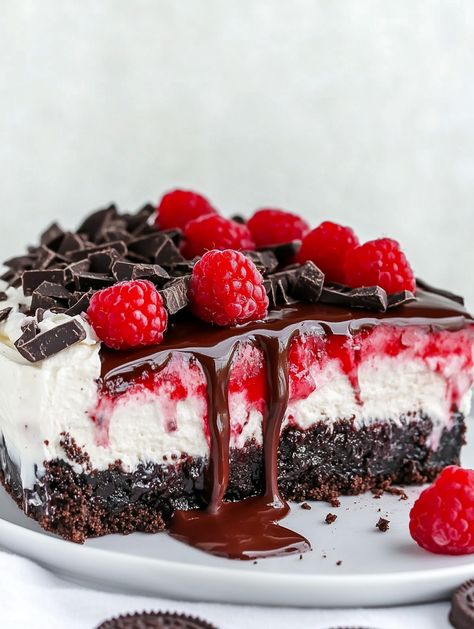 Black Forest Cheesecake Symphony 💖

💖 𝗜𝗻𝗴𝗿𝗲𝗱𝗶𝗲𝗻𝘁𝘀 💖
For the Crust:
24 Oreo cookies, finely crushed
¼ cup unsalted butter, melted
For the Filling:
3 packages (680 g) cream cheese, room temp
1 cup granulated sugar
¾ cup sour cream
⅓ cup unsweetened cocoa powder
1 tsp vanilla extract
3 large eggs
1 cup cherry pie filling
For the Ganache:
⅔ cup heavy cream
6 oz semi-sweet chocolate, chopped
For Garnish:
Fresh raspberries
Chocolate shavings 💖💖 Black Forest Cheesecake, Chocolate Covered Strawberry Cake, Triple Chocolate Mousse Cake, Chocolate Poke Cake, Unsweetened Cocoa Powder, Cheesecake Mousse, Lime Cheesecake, Cream Cheese Muffins, Ice Cream Floats