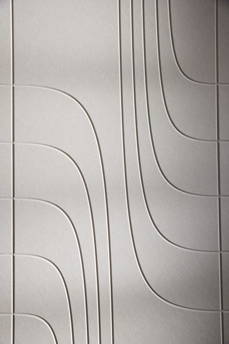 EchoPanel® Ohm is a precision cut acoustic panel with contoured linework reflecting the ebb and flow of sound waves. Featuring a bevelled edge, Ohm is ideal for panel-to-panel wall applications and is available in 12mm and 24mm thickness depending on acoustic requirements. EchoPanel® is a superior upcycled product with a 10-year life expectancy, after which the material is 100% recyclable. Click on the link to read more about it. #AcousticPanels #CeilingAcoustics #interiorarchitecture Wall Cladding Texture, Wall Panel Texture, Gehry Architecture, Cladding Texture, Woven Image, Mandir Design, Cmf Design, Acoustic Panel, Luxury House Interior Design