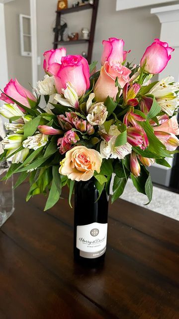 Harry & David on Instagram: "A bottle + a bouquet = our new favorite floral design 💐🍷" Seabass Recipe, Honey Parsnips, Alcohol Bouquet, Orange Juice Recipes, Bottle Juice, Red Bliss Potatoes, Sea Bass Recipes, Bottle Flowers, Infused Butter