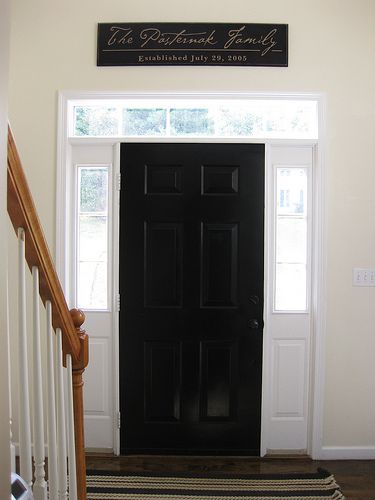 Black inside front door. Like the sign above door. Black Front Door From Inside, Over Front Door Decor, Black Front Door Inside Entryway, Decor Above Front Door Inside, Black Front Door With Sidelights Interior, Black Front Doors With One Sidelight, Above Front Door Decor Interior, Above Front Door Decor, Solid Black Front Door With Sidelights