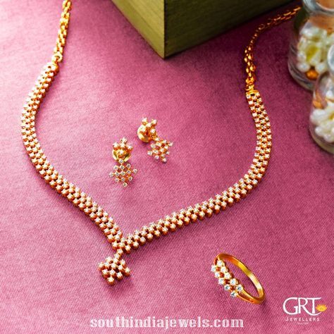 Simple diamond necklace set from GRT Jewellers. The necklace set consists of pair of earrings and rings. For inquiries please contact +914423461551. Simple Diamond Necklace, Grt Jewellers, Diamond Necklace Simple, Gold Jewelry Simple Necklace, Diamond Necklace Designs, Gold Necklace Indian Bridal Jewelry, Black Beaded Jewelry, Diamond Necklace Set, Simple Diamonds