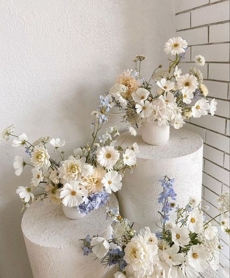 Sep 10, 2023 - This Pin was discovered by Leasie Bettiol. Discover (and save!) your own Pins on Pinterest Coastal Grandma Wedding Flowers, Civil Wedding Flowers, Blue Artificial Flower Arrangements, Tent Wedding Flowers, Minimal Modern Wedding Dress, Summer Blue Wedding Colors, High Low Centerpieces Weddings, 2024 Wedding Table Trends, White Flowers Aesthetic Wedding