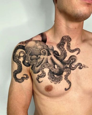 Chest Tattoos for Men Orange Octopus Tattoo, Octopus Thigh Tattoos Men, Octopus Rib Tattoo, Octopus Elbow Tattoo, Octopus Tattoo Men, Octopus Neck Tattoo, Octopus Tattoos Leg, Men’s Rib Tattoo, Octopus Chest Tattoo