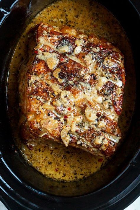 Creamy Garlic Pork Loin in Crockpot — Easy, comforting and tender pork loin in crockpot with the creamiest garlic sauce ever. Pork Loin In Crockpot, Garlic Pork Loin, Tender Pork Loin, Roast Mississippi, Pork Loin Crock Pot Recipes, Crockpot Pork Loin, Garlic Pork, Mississippi Roast, Crockpot Meal