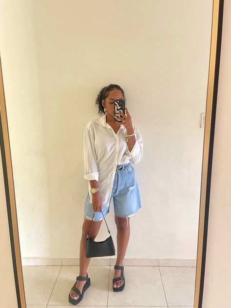 Denim long shorts with white long sleeve white shirt, flat chunky black sandals, mini hobo black purse Long Shirts With Shorts, Bum Shorts, Black Long Top, Long Sleeve White Shirt, Chunky Black Sandals, 2024 Outfits, Gray Shorts, Shorts Outfit, White Long Sleeve Shirt