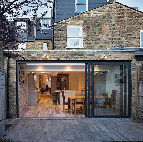 Stunning Earlsfield flat roof extension with stylish flooring running inside to out. ⠀