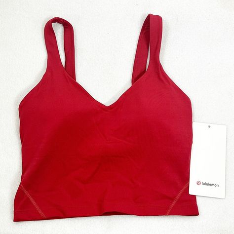 Nwt Lululemon Lunar New Year Align Tank Top Dark Red Gold Size 2 Lw1edzs Size 2 Dark Red Dkrd Style Lw1edzs Released Date:04/22 Purchased Directly From Lululemon Website Has A Built-In Shelf Bra. Made With Nulu Fabric. Provides Light Support For An A/B Cup. Tight Fit, Cropped Length. This Is The 2023 Lunar New Year Tank Top With A Gold Lululemon Logo On The Back. The Item Is Listed For A Price Greater Than Retail Because Is A Sought After, Color And Style And Is Sold Out. Nwt Lul-32223 Tags: Ath 2023 Lunar New Year, Align Tank Top, Cropped Half Zip, Align Tank, Lululemon Align Tank, Short Tank Top, Casual Preppy Outfits, Lululemon Tank Top, Workout Crop Top