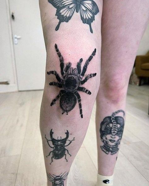 Explore the intriguing symbolism behind spider tattoos and get inspired with creative design ideas! From representing creativity and patience to symbolizing mystery and power, discover the various meanings of spider tattoos. Find the perfect design that reflects your personality and tells your unique story.  ... more Gothic Bug Tattoo, Coverup Tattoo Designs For Women, Tatu Ideas, Tarantula Tattoo, Tattoo Art Ideas, Coverup Tattoo Ideas, Insect Tattoos, Insects Tattoo, Spider Tattoos