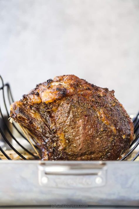 Perfect Garlic Herb Prime Rib Roast Recipe + Cooking Tips Prime Rib Roast Recipe Bone In Oven, Prime Rib With Garlic Herb Butter Recipe By Tasty, Herb Butter For Prime Rib, Garlic Herb Prime Rib Roast Recipe, Prime Rib With Garlic Herb Butter, Prime Rib With Herbs De Provence, Holiday Prime Rib, Slow Roasted Prime Rib, Prime Rib Roast Recipe