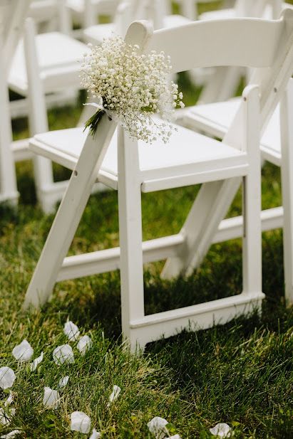 White Wedding Chairs Ceremony, Babies Breath Aisle Decor, Babies Breath Wedding Aisle, Baby Breath Wedding Aisle, Isle Decorations Wedding Outdoor, White Ceremony Chairs, Ceremony Chair Flowers, Baby Breath Down The Aisle, Wedding Ceremony White Chairs