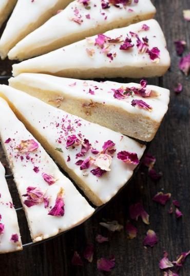 Vanilla Rose Shortbread Cookies - Elevate your cookies with edible dried flowers! These delicious Vanilla Rose Shortbread Cookies are glazed and topped with dried edible roses.