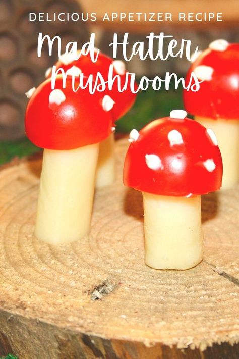 In Alice in Wonderland there is a magic mushroom that can make Alice change size. Create easy mushrooms from cherry tomatoes and string cheese. They are super cute and tasty but, thankfully, not of the magical variety. Alice In Wonderland Tea Sandwiches, Alice In Wonderland Fruit Tray, Alice In Wonderland Finger Foods, Cheshire Cat Food Ideas, Alice In Wonderland Appetizers, Alice And Wonderland Food Ideas, Toadstool Food, Mushroom Themed Food, Alice In Wonderland Dinner And A Movie