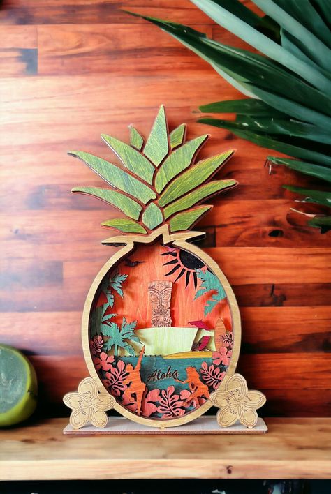 Aloha Pineapple Wall Decor 🍍 - Handcrafted in Oregon 🌲 - Choose Your Size! Transform your space with our unique layered wood art, inspired by the tropical vibes of Hawaii. Whether adorning your home, tiki bar, or bringing summer to your bedroom or bathroom, this exquisite piece radiates warmth and style. Each creation comes complete with a convenient sawtooth hanging bracket for easy display. 🖼️ Customizations: - Colorful Personalization: Want a different color scheme? Just let us know, and w Layered Wood Art, Pineapple Wall Decor, Wood Pineapple, Hawaiian Home Decor, Pineapple Wall Art, Hawaiian Homes, Tiki Decor, Hawaii Art, Pineapple Decor