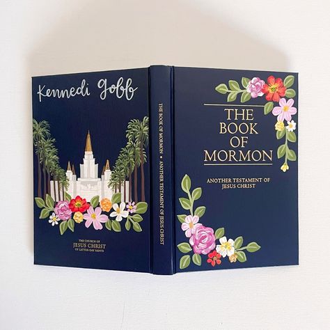 this painted cover was inspired by these beautiful photos of the Oakland Temple flowers (see second picture!) I just love the bright colors 💐 Book Of Mormon Painting, Painted Book Of Mormon, Oakland Temple, Christian Girlie, Book Of Mormon Scriptures, Scripture Painting, Mormon Scriptures, Painted Roses, The Book Of Mormon