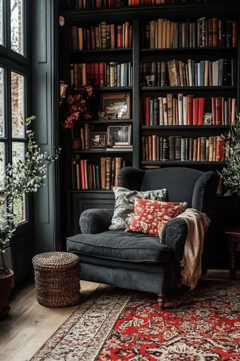 Elegant Dark Academia Home Decor: 15 Ideas & Tips Dark Painted Bookcases, Dark Academia Minimalism Interior, Reading Corner Dark Academia, Gothic Home Library Ideas, Dark Academia Armchair, Reading Room Dark Academia, Dark Academia Bookcase, Black Library Aesthetic, Dark Academia Shelves