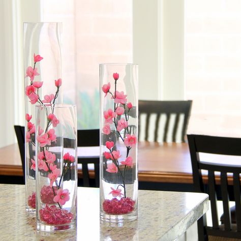 Japanese Centerpieces For Party, Japanese Cherry Blossom Decorations, Chinese Cherry Blossom Party Theme, Cherry Blossom Vase Decor, Japanese Centerpiece Ideas Table Decorations, Cherry Blossom Dinner Table, Diy Cherry Blossom Centerpiece, Japanese Cherry Blossom Quinceanera, Cherry Blossom Arrangement Decor