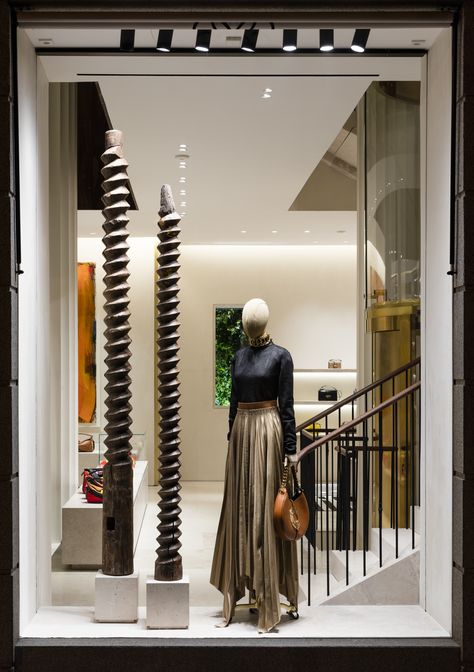 Casa Loewe wood-screw poles Loewe Store, Store Lighting, Metal Light Fixture, Wood Store, Lighting Concepts, Spring 2025, Creative Lighting, Design District, Miami Design