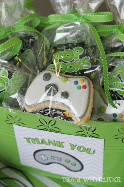 Time to get your game on. This video game birthday party has activities, creative (and tasty!) favor ideas and a rockin' dessert table. Halo Birthday Parties, Gamers Party Ideas, Xbox Birthday Party, Game Truck Birthday Party, Xbox Party, Video Game Party Favors, Cake Furniture, Game Truck Party, Video Games Birthday Party