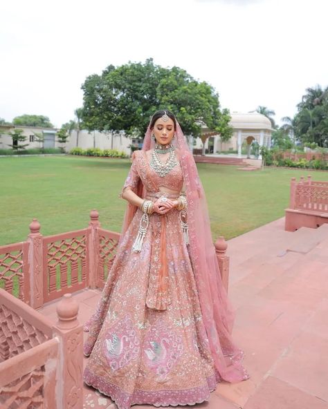 SetMyWed.com | Styling a daytime bridal ensemble with a whisper-soft pastel pink lehenga, eye-catching jewelry, and a subtle, radiant makeup look... | Instagram Reception Lehenga Bridal Pastel, Reception Lehenga Bridal, Bridal Reception Lehenga, Pastel Bridal Lehenga, Pastel Pink Lehenga, Radiant Makeup, Pink Bridal Lehenga, Lehenga Pink, Indian Bridesmaid Dresses