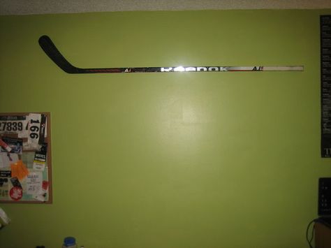 Mounting on the Wall Hockey Stick Furniture, Stick Furniture, Hockey Sweater, Quote About Love, Diy Holder, Hockey Fans, Love And Friendship, Picture Hangers, Hockey Stick