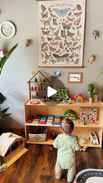 Evelyn on Instagram: "This room used to be where we grew our chicks till they were big enough for the coop! A total dust fest😂  With my husband working from home, I decided to create a play space that we could nest in and play in for many hours to not interfere with meetings.  I love lots of colour and playful things! This room is as much for me to enjoy being in as it is for the kids! They enjoy hours of open ended play with our Waldorf inspired toys.  Are you team separate play space or do you incorporate your play area with your living room?  We have done it both ways and in this season the separate room is working best!  Let me know if you have any questions in the comments, I will answer them all❤️☺️   None of these items are sponsored, I bought them all and love them❤️🥰  @toverlux Family Room Play Pen, Waldorf Playroom At Home, Playroom Waldorf, Baby Room Play Pen Bed, Kids Play Area In Living Room, Playroom Village, Roo And You Play Couch, Floor Bed Baby With Playpen, Kids Play Corner