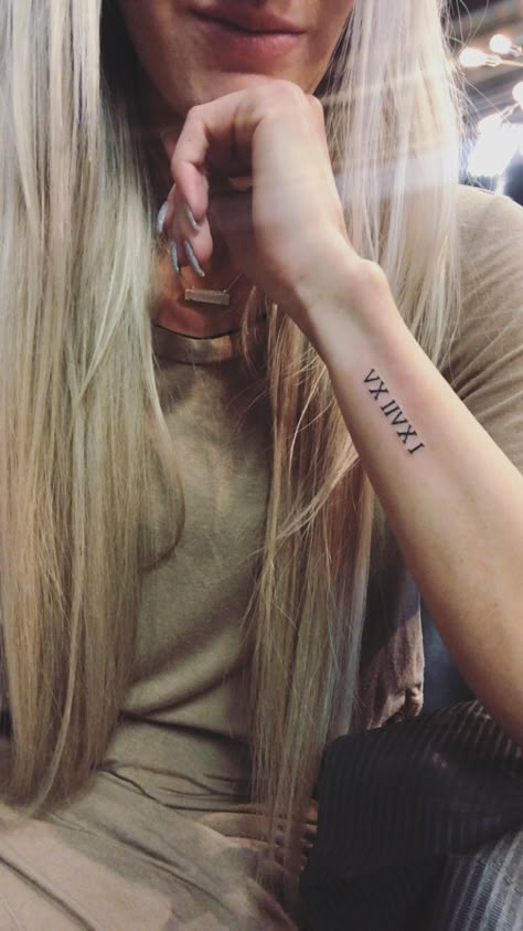 Roman numeral tattoo, tiny tattoo, wrist tattoo, anniversary tattoo Wedding Date Tattoo Placement, Roman Numeral Tattoo Anniversary, Dainty Roman Numeral Tattoo Wrist, Roman Numeral Tattoo Side Arm, Date Wrist Tattoos For Women, Wrist Tattoo Roman Numerals, Small Roman Numeral Tattoo Wrist, Women Roman Numeral Tattoo, Roman Numeral Placement Tattoo