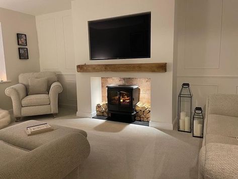 Snug Room With Fireplace, Cosy Panelled Living Room, Small Lounge Fireplace Ideas, Terraced House Lounge Ideas, Wall Panelling Around Fireplace, New Build Fireplace Ideas Uk, Log Fire Media Wall, Cosy Media Wall, Living Room Panelling With Fireplace