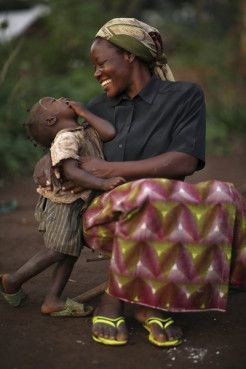 Teaching Congolese refugees self-sufficiency gains nun U.N. recognition Kaira Looro, Maternal Health, Happiness Is A Choice, A Mother's Love, Mother Child, Mother's Love, Eye Photography, Black Families, Smiling Dogs