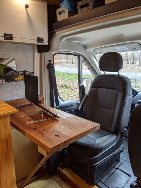 11 Ingenious Camper Van Office Ideas for Work on the Road Campervan Workspace, Van Desk Ideas, Van Sliding Door Ideas, Van Desk Work Spaces, Camper Van Office Ideas, Van Life Work Space, Space Saving Van Conversion, Sprinter Van Office, Camper Van Workspace