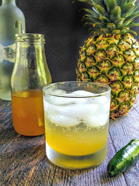 This pineapple jalapeño shrub cocktail has the sweetness of pineapple, the tang of vinegar and the heat of jalapeños. Great with seltzer or vodka for a refreshing summer drink. Shrub Drink, Best Herbal Tea, Medicinal Tea, Vinegar And Honey, Refreshing Summer Drinks, Summer Drink, Summer Refreshments, 28 Days, Summer Cocktails