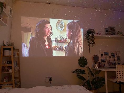 #coquette #roomdecorbedroom #projector #movienight #aesthetic #aestheticroomideas #gilmore #taylorswift Projector In Bedroom Aesthetic Cozy, Aesthetic Room Projector, Cozy Room With Projector, Bedroom Movie Projector, Small Room Projector Setup, Dorm Room Projector, Room Projector Aesthetic, Dorm Projector, Small Room Projector