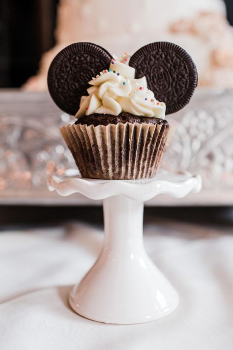 Everyone knows a Disney-fanatic bride. “Be our guest” to ooh and ah over the happiest party on earth filled with favorite movie quotes on table numbers and Mickey Mouse-shaped desserts. #southernliving #wedding #bridalshowers Bridal Shower Favors Disney, Disney Bridal Shower Decorations, Subtle Disney Bridal Shower Ideas, Disney Bridal Shower Favors, Bridal Shower Ideas Disney, Disney Wedding Cupcakes, Disney Winter Wedding, Disney Wedding Shower Ideas, Movie Themed Bridal Shower Ideas