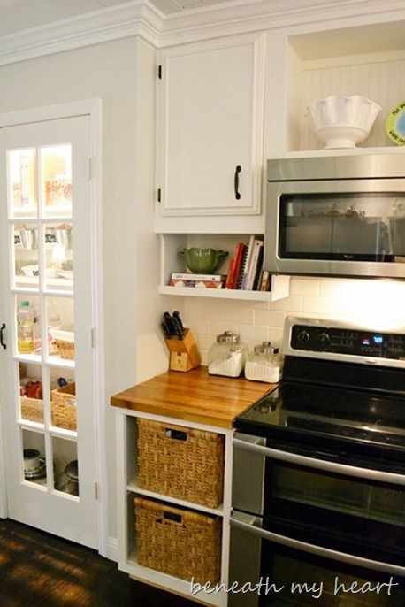 if redoing an older kitchen, move cabinets up to ceiling height, then add under-cabinet storage for cookbooks/spices/etc.  I also love the baskets and butcher-block.  thanks Beneath My Heart Under Cabinet Shelf, Kitchen Cabinets To Ceiling, Cookbook Storage, Cabinets To Ceiling, Cookbook Shelf, Under Cabinet Storage, Top Decor, Diy Kitchen Cabinets, Diy Cabinets