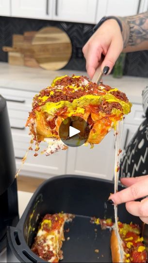 A new way to do hotdogs! | A new way to do hotdogs!

Jen makes a loaded pizza dog in the air fryer | By Justine’s Kitchen | Alright, that was four hotdog
buns in our air fryer. I'm going right in with our ragu
and a small little ice cream scoop for this super fun and
easy little air fryer recipe. It's a little gloomy out today.
So, instead of barbecuing, we are going straight for the air
fryer for this perfect little barbecue recipe. Just going in
with maybe one to two scoops of my favorite pizza sauce right
into those hot dog buns just like so. I Perfect. You could
do a pesto and a or an Alfredo here but I love just using the
original marinara. I'm going in next. I have just some
beautiful little sausage Franks. I'm just going to pop
those right into our buns and I just kind of went with Pizza Dog, Barbecue Recipe, Air Fryer Recipe, Hot Dog Recipes, Barbecue Recipes, Pizza Sauce, Marinara, Ice Cream Scoop, Quick Recipes