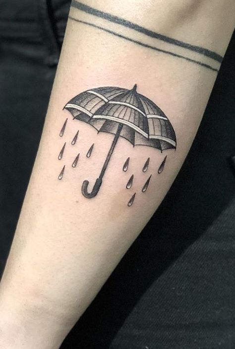 Rate This Umbrella Tattoo 1 to 100 #tattoo #tattoos #smalltattoos #amazingtattoo #beautifultattoos #watercolorTattoo #InspirationalTattoos #ArtTattoo #NeonTattoo #CoolTattoos #TattooDrawings #BodyArtTattoo #Tattoo Sketches #FootTattoos #CelestialTattoo Upside Down Umbrella Tattoo, Umbrella Rain Tattoo, Umbrella Tattoos, Rain Tattoos, Rain Tattoo Ideas, Zipper Tattoo, Tattoos For Baby Boy, Rain Tattoo, Umbrella Tattoo