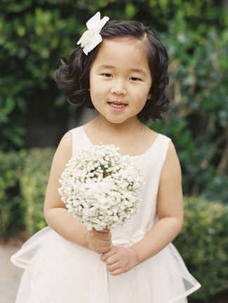 For flower girls: "A bow just makes everything sweeter. A deep side part and loose curls look polished and playful."  14 Adorable Flower Girl Hairstyles | TheKnot.com Flower Girl Wedding Hair, Girls Updo Hairstyles, Wedding Hairstyles For Girls, Short Hair For Kids, Girls Updo, Girl Hairdos, Floral Wedding Hair, Black Toddler, Curly Wedding Hair