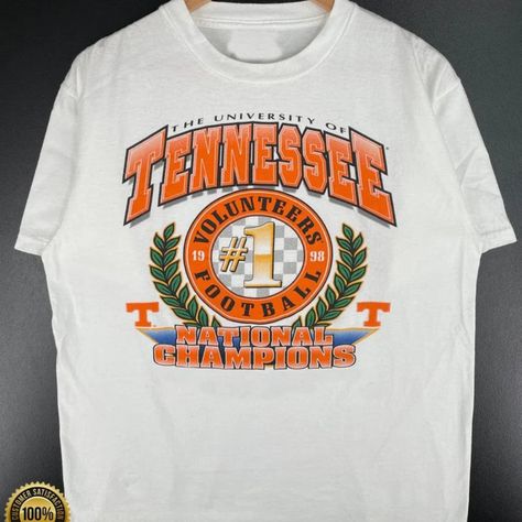 Vintage Ncaa Tennessee Volunteers Champions T-Shirt, Tennessee Volunteers Shirt, University Of Tennessee, Unisex Shirt, Vintage Shirt Reprinted Shirt Made By Gildan Brand 5.3-Ounce, 100% Cotton (99/1 Cotton/Poly (Ash) & 90/10 Cotton/Poly (Sport Grey) Heavyweight Classic Unisex Tee Taped Neck And Shoulders; Tearaway Label Decoration Type: Digital Print Volunteer Shirt, Tennessee Shirt, University Shirt, University Of Tennessee, Tennessee Volunteers, Champion Sweatshirt, Vintage Shirt, Football Shirt, Logo Tees