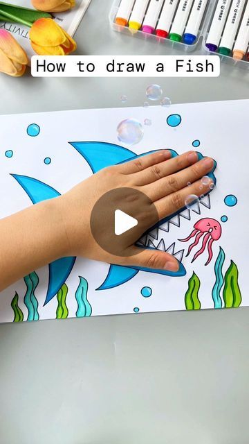 Simple and Easy Drawing Ideas on Instagram: "Learn how to draw a fish with this easy, simple, and creative tutorial! Watch as I guide you step-by-step, starting with basic shapes and lines to form the fish's body, fins, and tail. Add fun details like scales and bubbles to bring your drawing to life. Perfect for beginners and kids, this drawing tutorial will help you create a cute and colorful fish in no time. Grab your drawing supplies and join me for a fun and relaxing art session!" Good Things To Draw Easy, Drawing Ideas Step By Step Easy, How To Draw A Shark Easy, Simple Fish Art, Hand Tracing Art For Kids, Easy Beginner Drawings Step By Step, Drawing With Shapes For Kids, How To Paint Fish, Basic Art Drawings