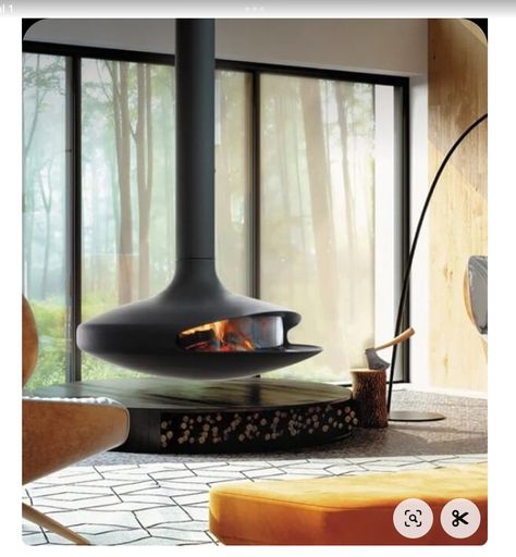 Wall Hanging Fireplace, Focus Fireplaces, Fireplace Styles, Modern Wood Burning Stoves, Contemporary Fireplace Designs, Suspended Fireplace, Luxury Fireplace, Hanging Fireplace, Floating Fireplace