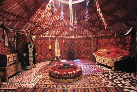 Colorful rugs line the walls and floor of a tent in Kazakhstan. Yurt Interior, Mongolian Yurt, Yurt Home, Bedouin Tent, Yurt Living, Red Tent, Bell Tent, Silk Road, Homework Help