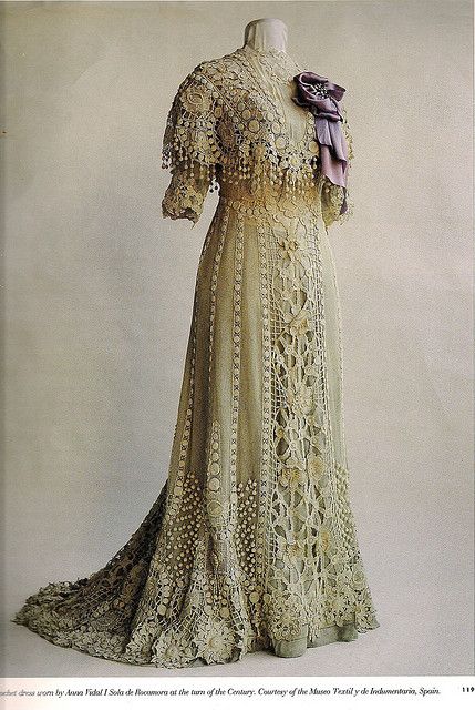 This historical dress is worn over a green under dress, by this method color is used to emphasize the motifs within the design and allows the eye to fully appreciate the design. Crochet Wedding Dresses, Wedding Gowns Vintage, Antique Dress, Vintage Gowns, Antique Clothing, Old Fashion, Edwardian Fashion, Historical Dresses, Belle Epoque