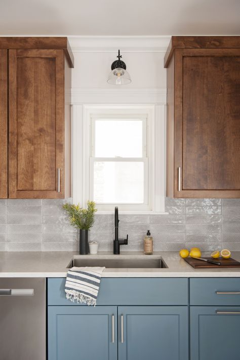 Blue painted lower kitchen cabinets with wood upper cabinets and light gray quartz countertop. Two Tone Kitchen Cabinets, Two Tone Cabinets, Upper Kitchen Cabinets, Blue Kitchen Cabinets, Two Tone Kitchen, Wood Kitchen Cabinets, Blue Cabinets, Low Cabinet, Upper Cabinets