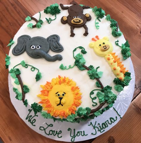 8” chocolate cake with buttercream frosting. All decorations are buttercream. Simple Animal Cake, Animal Theme Cakes For Kids, Buttercream Animals Piping, Jungle Birthday Cake Diy, Animal Buttercream Cake, Wild Safari Cake, Safari Theme Cake 1st Birthdays, Simple Jungle Cake, Jungle Birthday Cake Simple