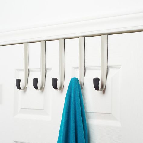 Our good-looking Schnook 5-Hook Over the Door Hook Rack by Umbra can quickly be added to an office, closet, bathroom or mudroom door to create instant, accessible storage of towels, coats, hats or umbrellas. Each hook features a rubber tip to keep items in place. The overdoor hooks are padded with foam to protect your door. Made from steel with satin nickel finish Fits most standard residential doors Over The Door Hook, Door Hook, Over The Door Hooks, Stamped Metal, Hook Rack, Residential Doors, Door Hooks, Bathroom Storage Organization, Rack Design