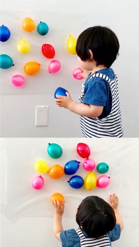 Sticky Wall Balloon Sensory Activity for babies and toddlers. Great fine motor skills activity! Learn colors and counting too #hellowonderful. Sensory Play Ideas 1 Year, Sensory Balloons, Activity For Baby, Activity For Babies, Toddler Fine Motor Activities, Fine Motor Skills Activity, Motor Skills Activity, Hello Wonderful, Sticky Wall