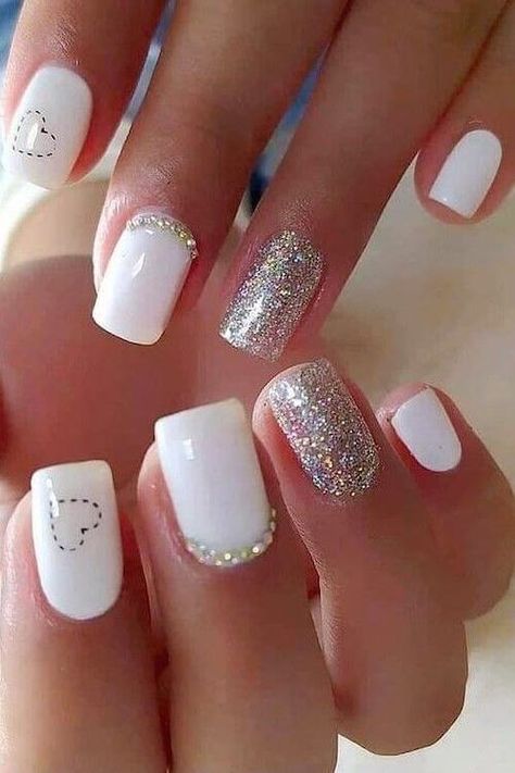 70 Cute Valentine's Day Nail Designs You Will Love 2023 White Nail Art Short Nails, Classy Nails Short Winter 2023, Gel Nails White Short, Gel White Nail Designs, Short White Valentines Nails, White Valentine’s Day Nails, Short White Gel Nails With Design, Cute Valentines Day Nails Acrylic Short, Heart Nails With Glitter