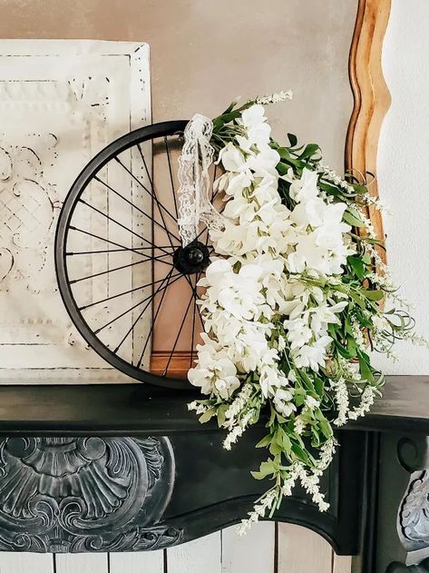 See how she upcycled this bicycle wheel and turned it into a stunning spring wreath that only looks expensive. Quick and budget friendly spring wreath for front door decor. Bicycle Wheel Wreath, Wheel Wreath, Spring Wreath For Front Door, Diy Spring Wreath, Bicycle Wheel, Matte Paint, Diy Spring, Old Bikes, Bike Wheel